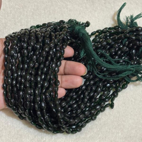 Monalisa Flat oval shape Beads Dark Green 4.5x7mm, Minimum Order Qty 2 lines