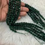 Dul Dul Beads Green colour   5 X 7mm approx